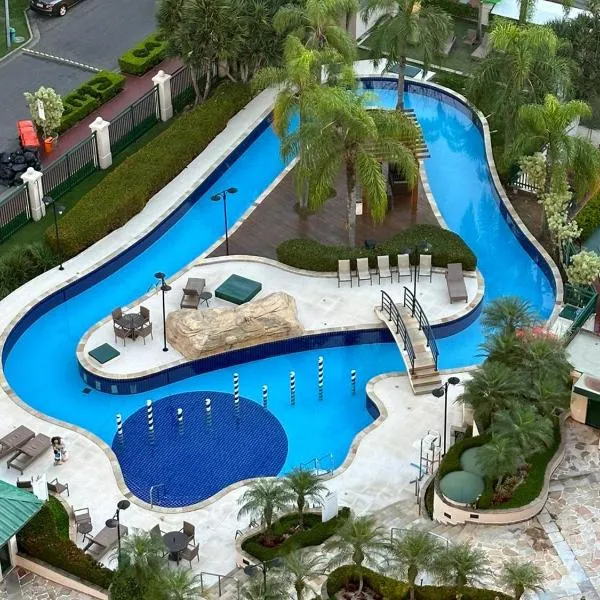Flat com Vista Panorâmica -15- na Barra da Tijuca - Estacionamento Gratuito - Frigobar - Ar condicionado - Piscina - Academia - Balsa para Praia Grátis - Varanda - Vista Parcial Mar e Lagoa，位于里约热内卢的酒店