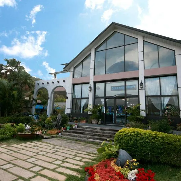 茴香恋恋温泉会馆，位于Mudan的酒店