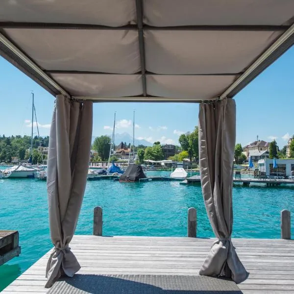 Boutique Apartments Velden，位于沃尔特湖畔韦尔登的酒店