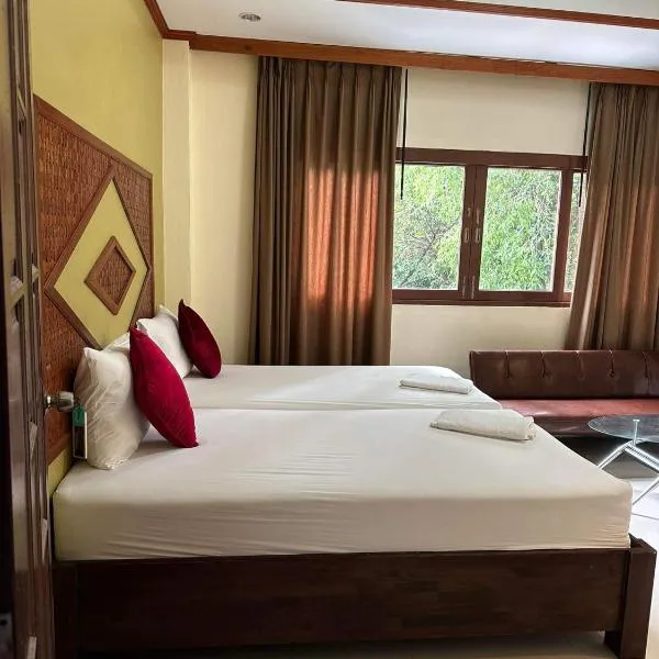 布达拉克撒旅馆，位于通奈潘海滩的酒店