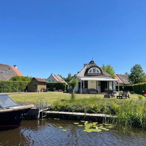 Vakantiehuis aan het water in Friesland，位于奥德米拉得姆的酒店