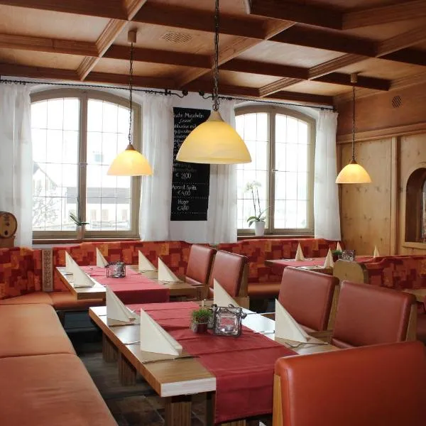 陶尔米纳比萨餐厅旅馆，位于罗斯豪普滕的酒店