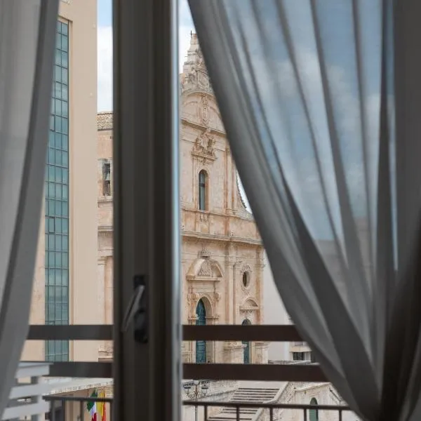 Central House palazzo Brafa una camera di albergo，位于伊斯皮卡的酒店