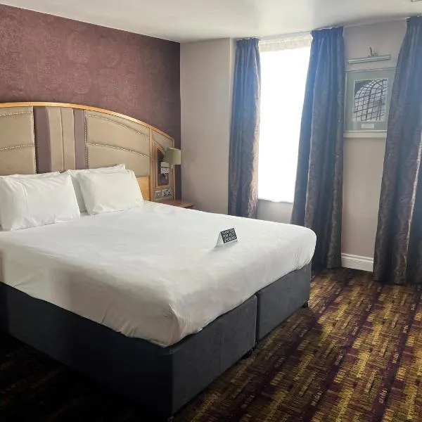 威瑟斯本金狮酒店，位于Wainscot的酒店