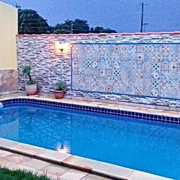 Vila agradável e confortável com piscina，位于皮雷诺波利斯的酒店