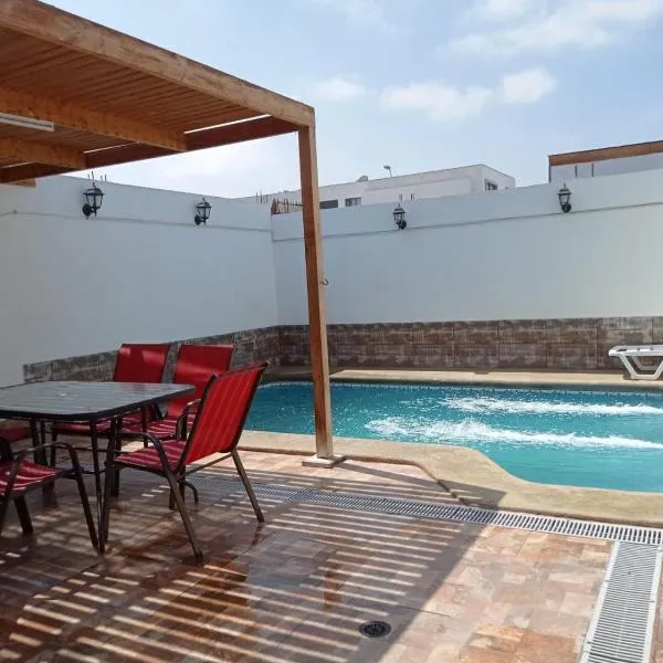 Cómoda casa con piscina，位于阿里卡的酒店