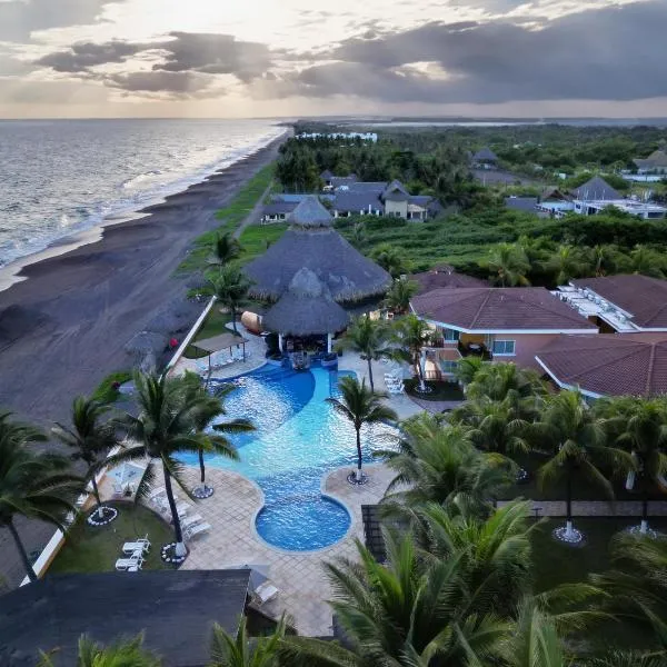 Hotel Cayman Suites，位于Ceiba Mocha的酒店