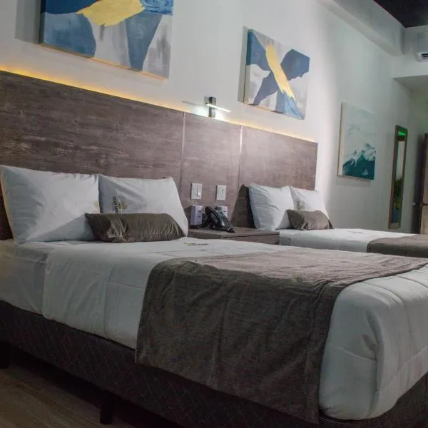 Hotel StayHome，位于恩塞纳达港的酒店