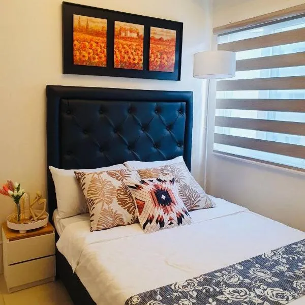 2 Br CONDO Vine Residences Quezon City with POOL WIFI Karaoke BOARD GAMES NETFLIX，位于Sapang Alat的酒店