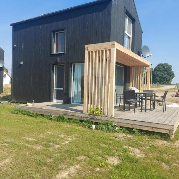 Haus Masuren, bei Ilawa, Angelbootvermietung, Dom czerwony i zielony，位于Szwarcenowo的酒店