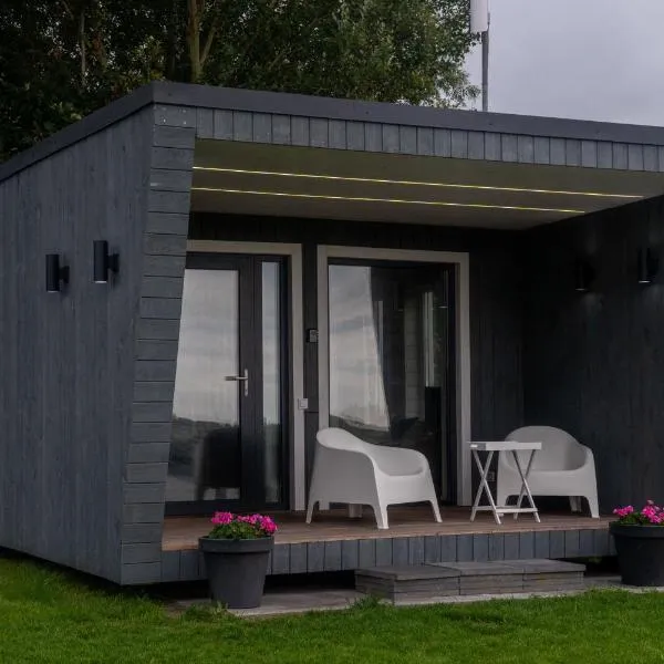 Tiny house aan het water op de appelhof，位于Wommels的酒店