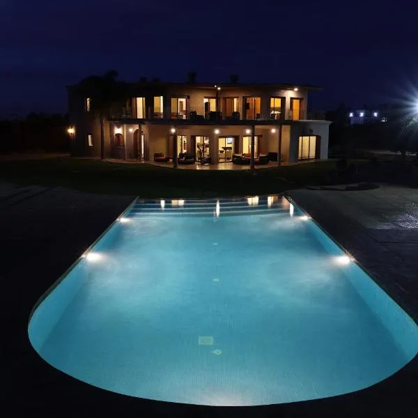 Villa Tizra - Guest house，位于Aïn el Ksob的酒店