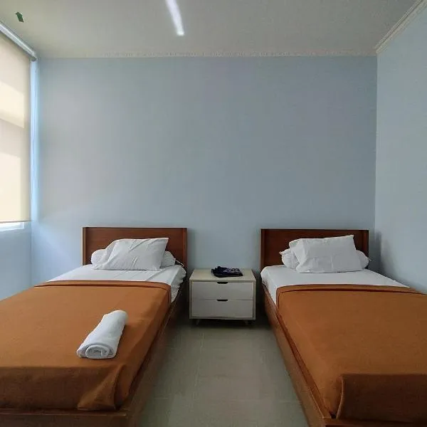 Hotel Sutha Inn Syariah，位于占碑市的酒店