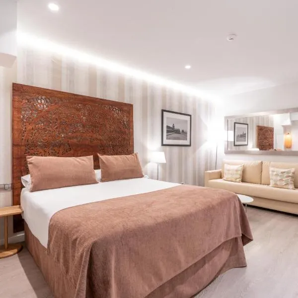 Serennia Fira Gran Via Exclusive Rooms，位于略夫雷加特河畔奥斯皮塔莱特的酒店