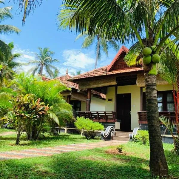 Maadathil Cottages & Beach Resort，位于Kondālseri的酒店