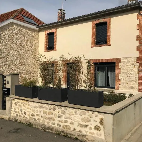 Agréable maison petit jardin à 7 minutes de Reims，位于Pargny-lès-Reims的酒店