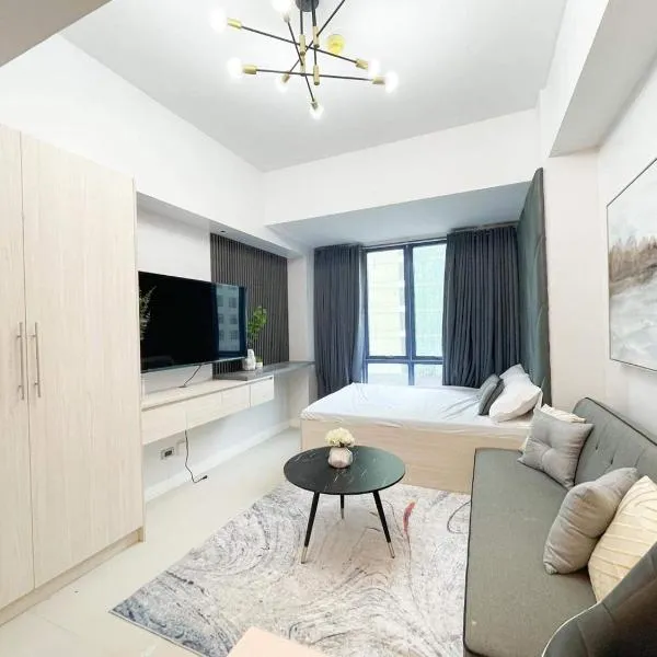 38 Park Avenue right in the heart of IT Park Cebu, 55 inches TV, wifi，位于塔博克的酒店