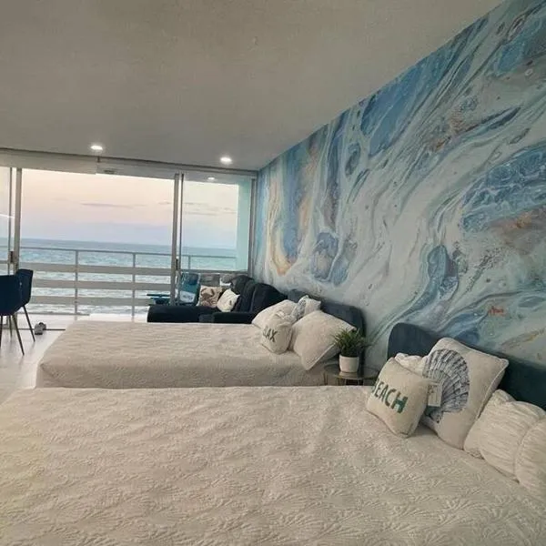 Beautiful Ocean Blue Love oceanfront apartment，位于法哈多的酒店