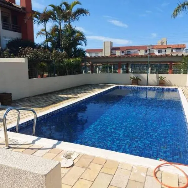 Apartamento em Capão Novo com piscina，位于阿罗尤特谢拉的酒店