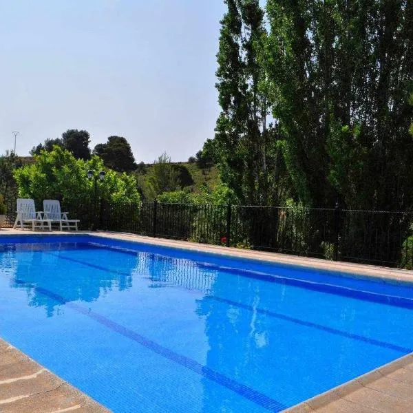 Casa rural El Salero Piscina campo de fútbol y voley chimenea barbacoa，位于莫拉塔利亚的酒店