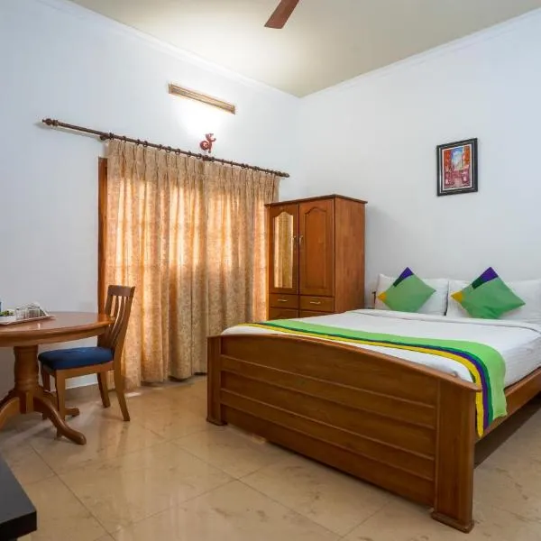 Itsy By Treebo - Classio Inn，位于Santhanpara的酒店