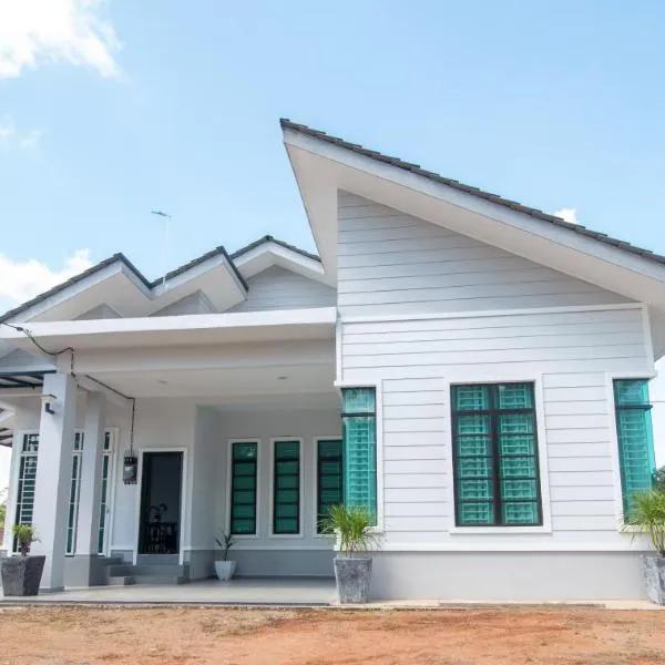 Romi Homestay Wakaf Tapai，位于Kampong Kayu Arang的酒店