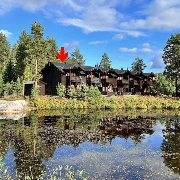 Flott hytte i Vrådal rett ved alpinbakken，位于Vråliosen的酒店