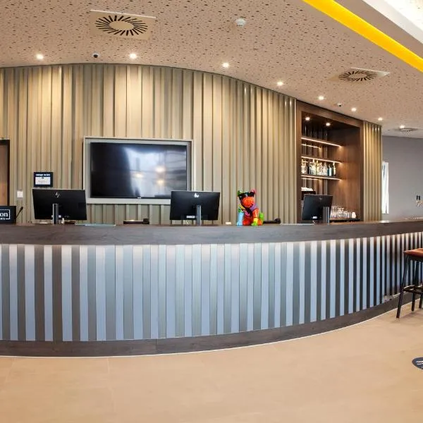 Hampton by Hilton Munich Airport South，位于哈尔伯格摩斯的酒店