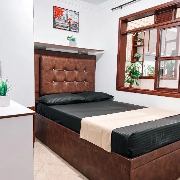 Descansa sin ruido a pasos del centro y del Museo Rayo，位于Roldanillo的酒店