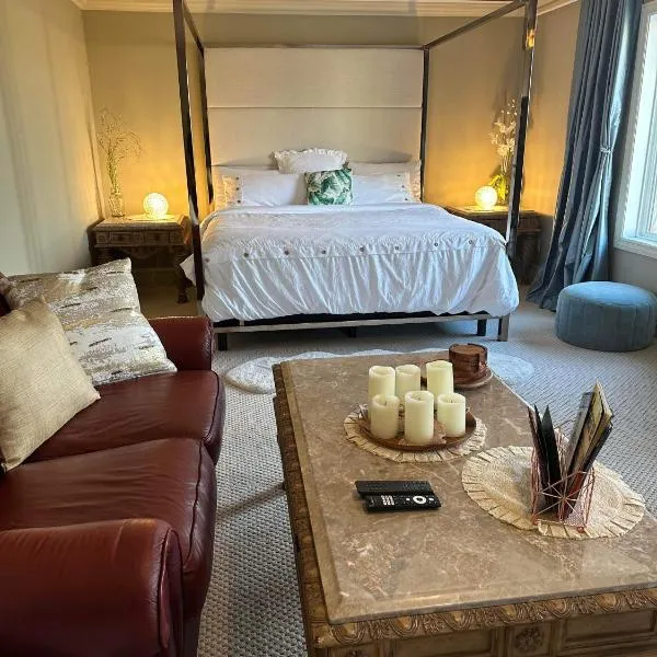 Royal highland livingroom bedroom suite，位于Bearspaw的酒店