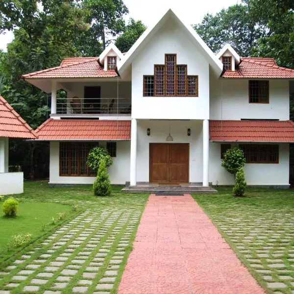 4 Bedroom House at Kottayam Town Ac 812'983'5682 Germa'n villa，位于戈德亚姆的酒店