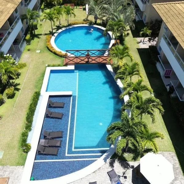 Guarajuba-Village de Alexandre. Praia e Piscina!，位于瓜拉久巴的酒店