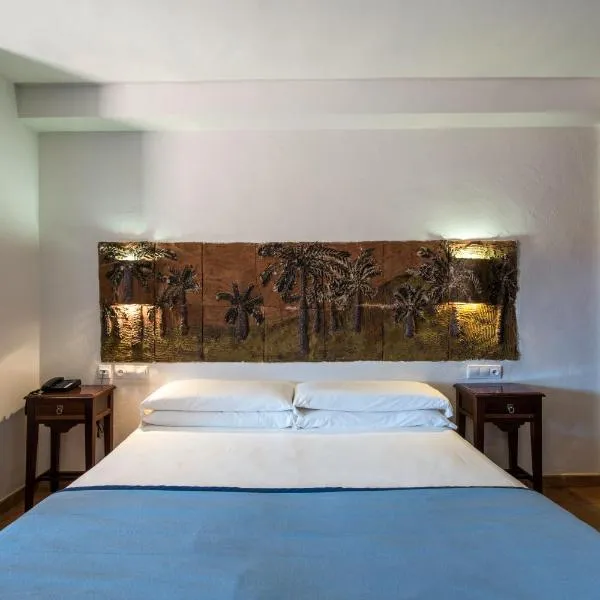 罗达尔基拉尔自然酒店与卡波德加塔水疗中心，位于厄尔·坎皮洛·德·罗达尔的酒店