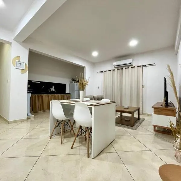 Apartamento cerca del Aeropuerto，位于Emboscada的酒店