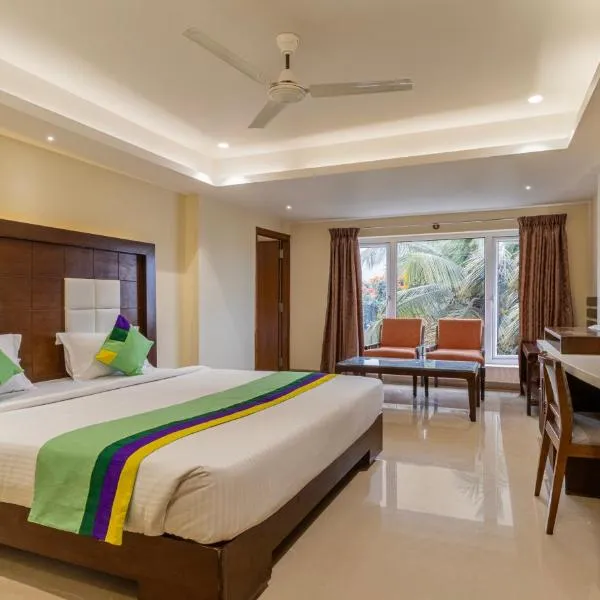 Treebo Trend Suvarna Comforts，位于哈桑的酒店