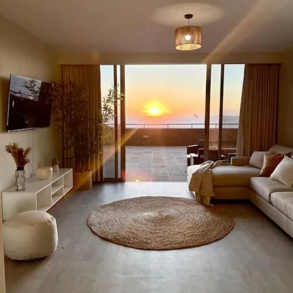 Infinity Sunset Beachfront Apartment，位于梅尔克博斯特兰的酒店