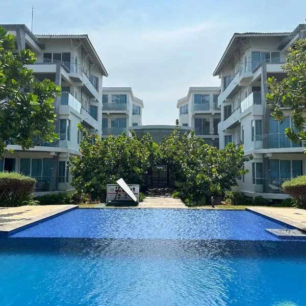 Apartment314 Oceanfront condos Nilaveli，位于亭可马里的酒店