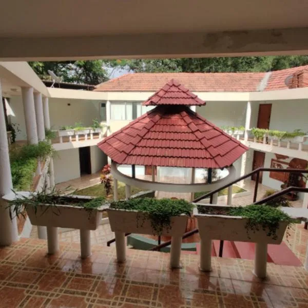 Nisarga Resort，位于Hārohalli的酒店