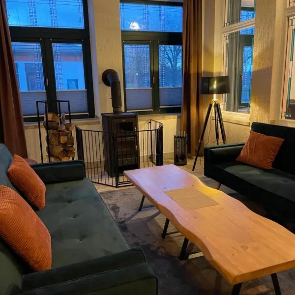 Ferienwohnung mit Kamin und traumhafter Dachterrasse mit Weitblick in die Natur，位于Neu Gaarz的酒店