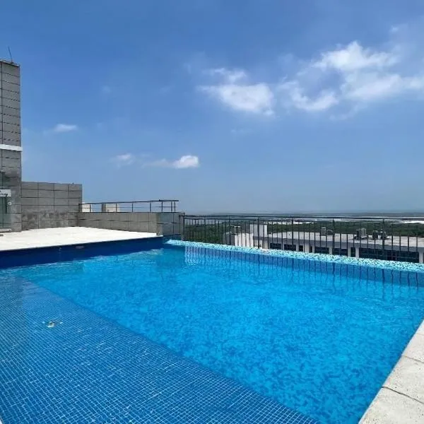 Luxury Apartamento Hilton WI-FI, TV, Piscina y Gym，位于巴兰基亚的酒店