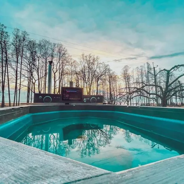 Hide in the nature – cozy lakeside saunacottage，位于Kivilõppe的酒店