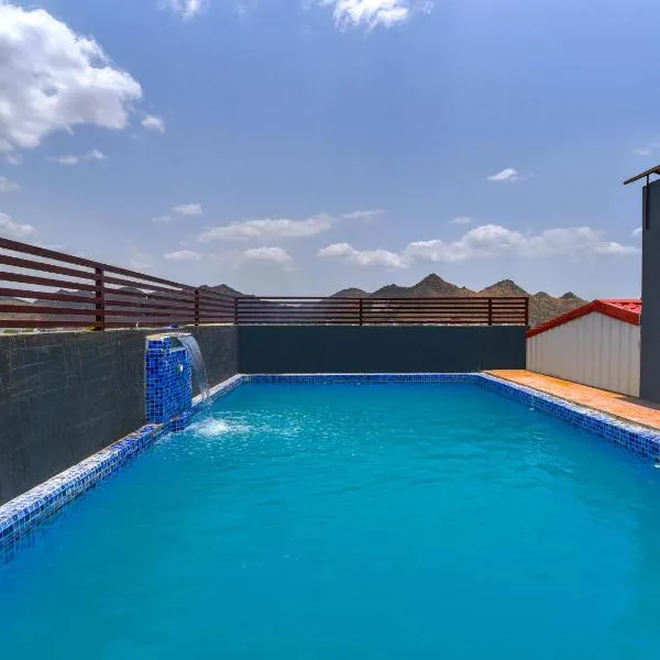 Mangal Residency Rooftop Pool，位于Rāma的酒店