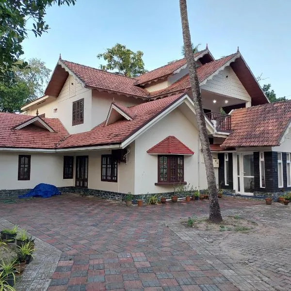 SARAS HOME ALAPPUZHA BEACH，位于阿勒皮的酒店