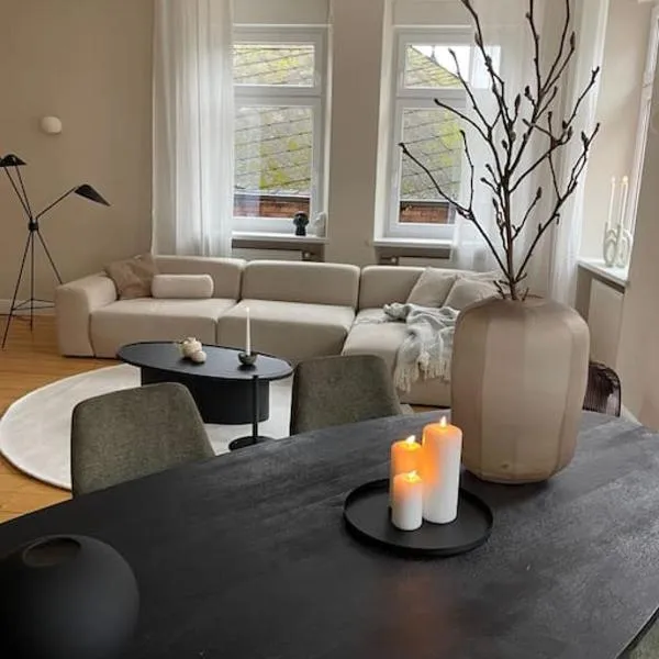BG Living & Hosting - Exklusive Jugendstilwohnung an der Mosel in Ürzig - 2 Schlafzimmer, bis 4 Personen, Fahrradkeller, Waschmaschine & Trockner，位于于尔齐希的酒店