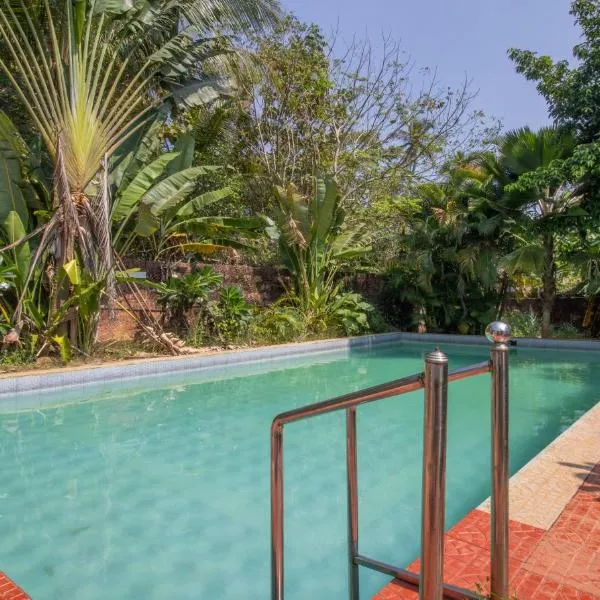 Treebo Trend Sadhoo Heritage Ayurvedic Spa & Pool，位于Chakkarakkal的酒店