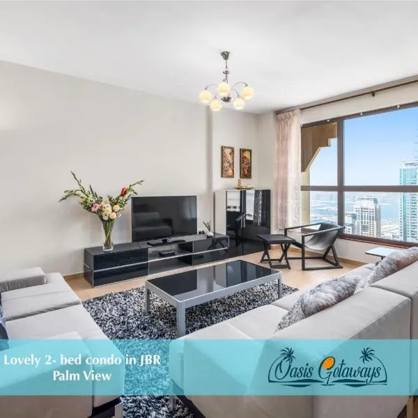 Lovely 2-bed condo in JBR - 5 mins from beach - Palm View!，位于迪拜的酒店