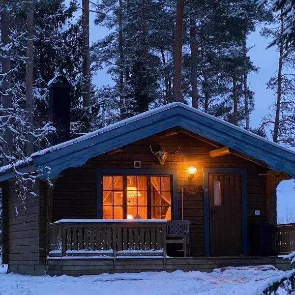 Timrad stuga i kanten av skogen med SPA möjlighet，位于穆尔舍的酒店