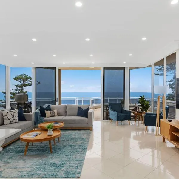 Ocean Vista Escape - A Lofty Beachfront Penthouse，位于卧龙岗的酒店