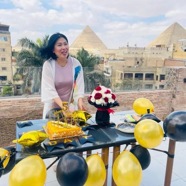 Pyramids Paradise View Inn Hotel，位于Kafr Abū ʼumaydah的酒店