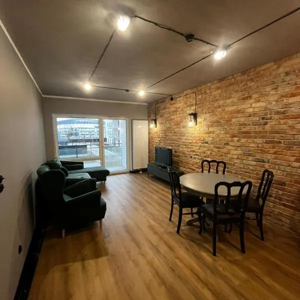 APARTAMENT z widokiem na stadion Styl Industrialny Jedyny taki CHECK IN 24 H，位于波兹南的酒店